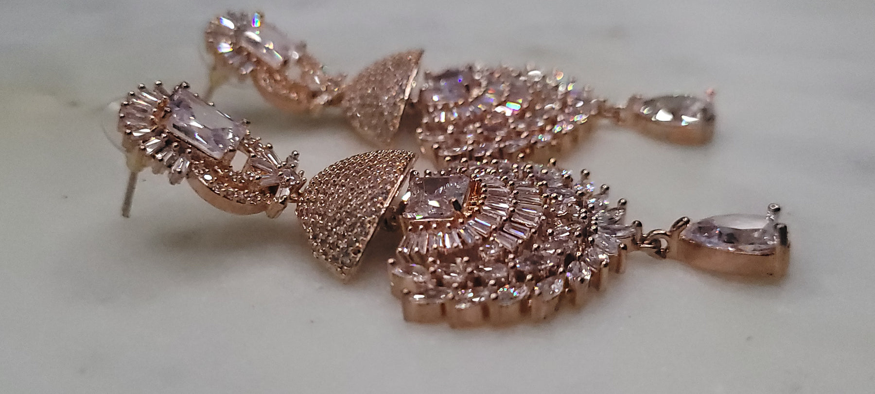 UNIQUE AND PRECIOUS ROSE GOLD DIAMOND EARRINGS