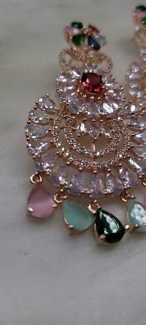 Fabulous colored diamond earrings in rose gold tone