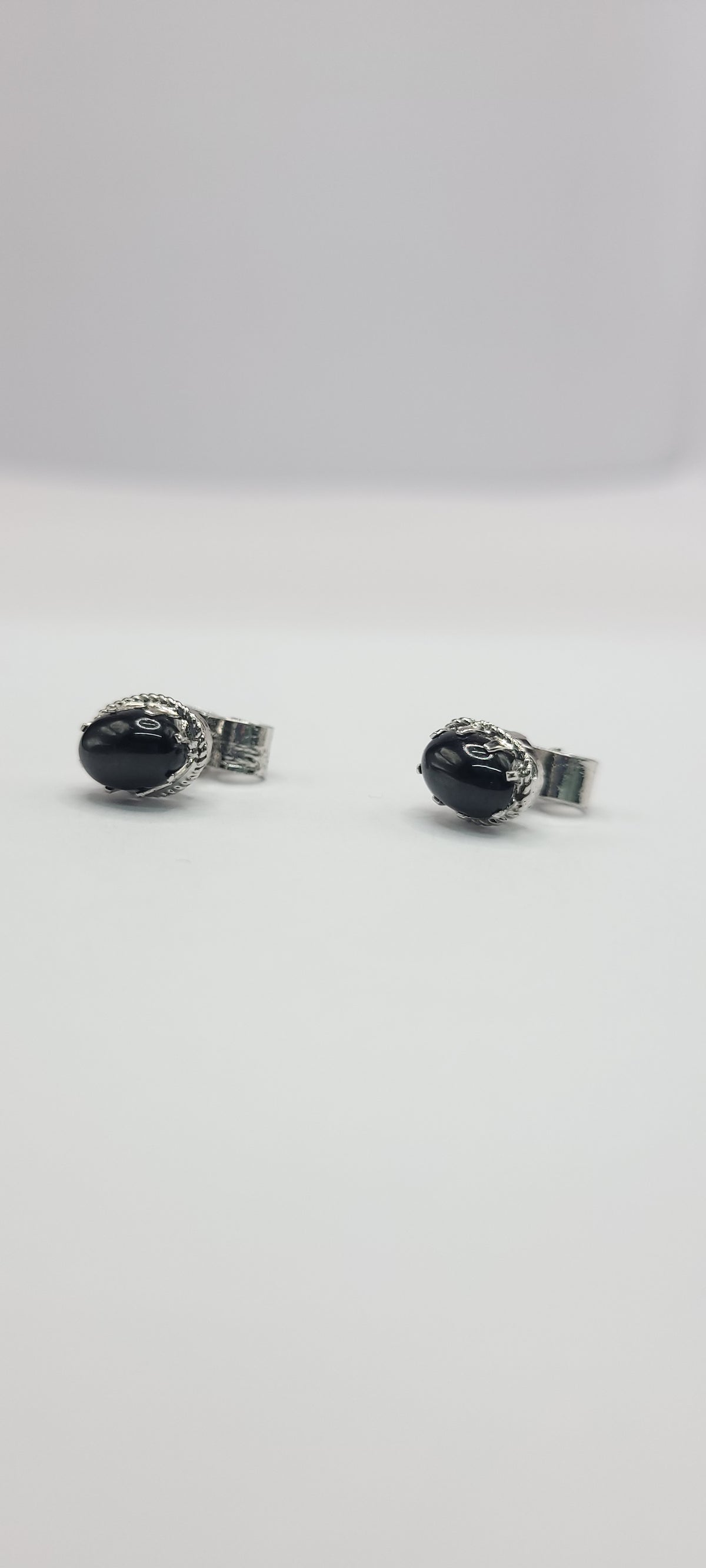 Black star stone on sterling silver studs