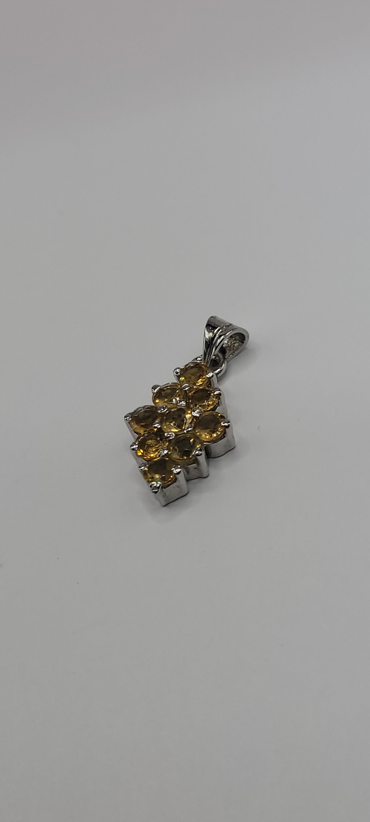 Yellow Topaz Stone Surrounded with Zirconia on Sterling Silver