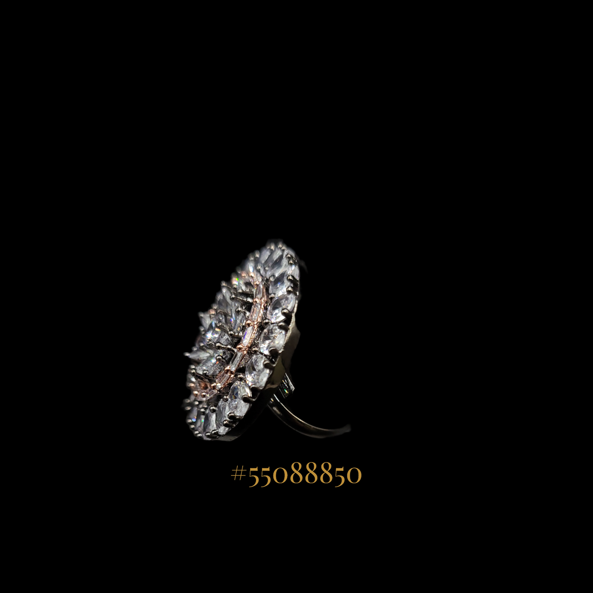 STUNNING DIAMOND DESIGN RING WITH A SMALL TOUCH OF ROSE GOLD.