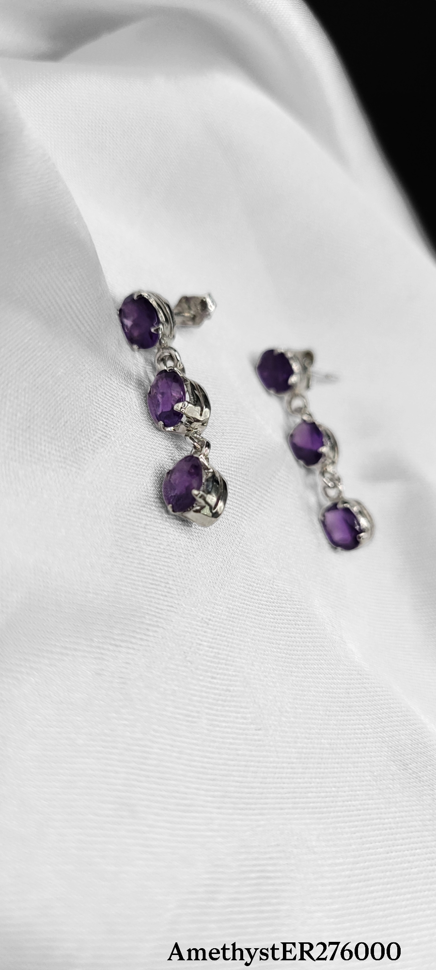 BEAUTIFUL AMETHYST DANGLE STYLE EARRINGS ON STERLING SILVER. AMETHYST IS RECOGNIZED AS A STONE OF SPIRITUALITY & CONTENTMENT.