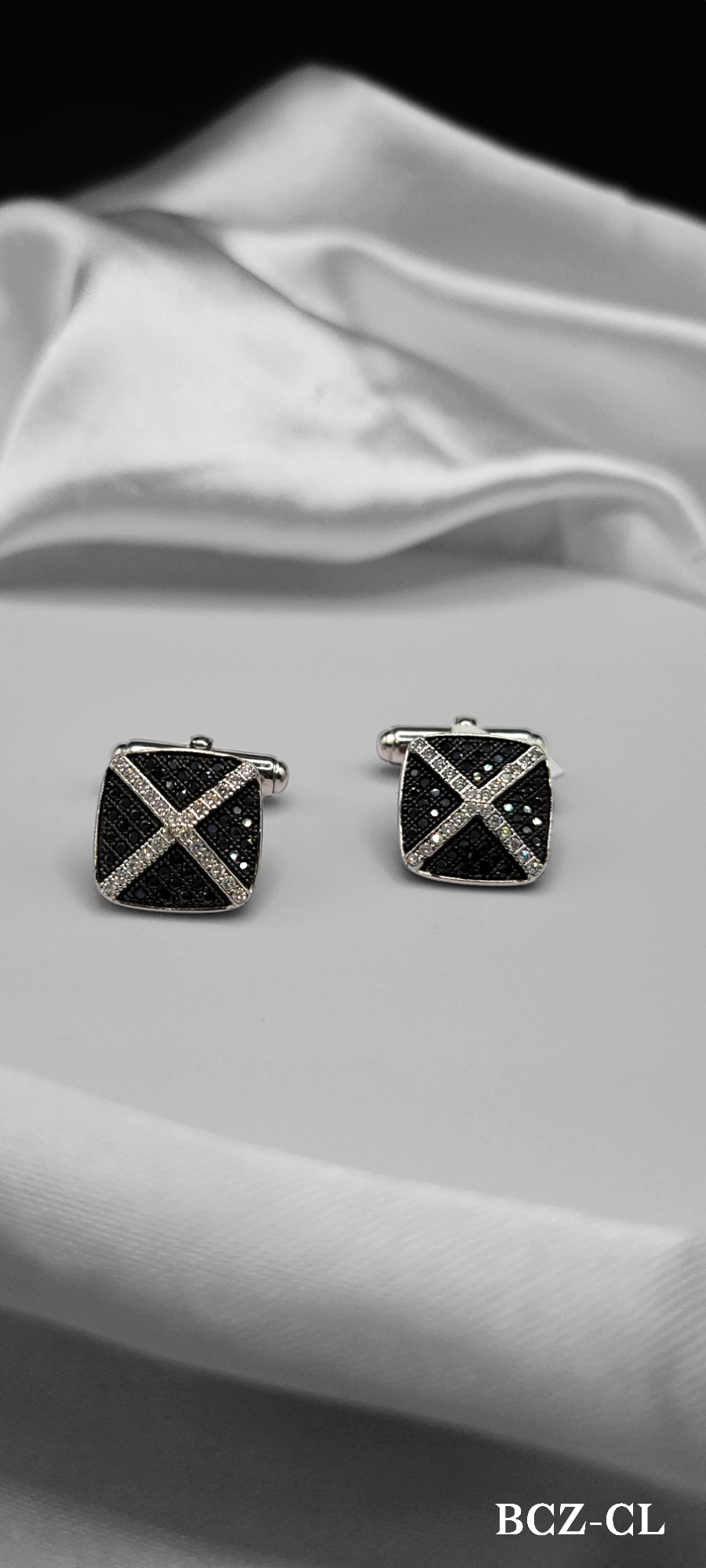 BLACK CUBIC ZIRCONIA STONE CUFF LINKS ON STERLING SILVER. DRAMATIC STATEMENT PIECE! KNOWN AS THE STONE OF PRACTICALITY.
