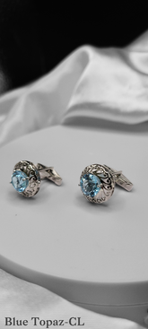 BLUE TOPAZ CUFF LINKS ON STERLING SILVER. KNOWN TO PROMOTE HARMONY & CALMNESS, THE SOOTHING STONE.