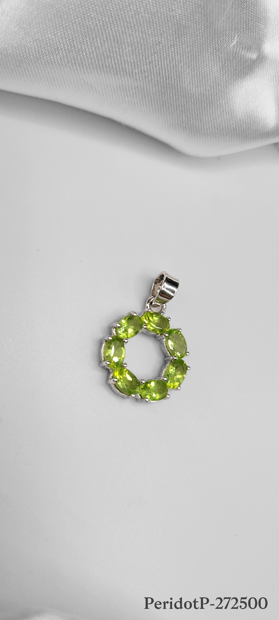 BEAUTIFUL PERIDOT STONE PENDANT ON STERLING SILVER. PERIDOT IS KNOWN AS THE STONE OF COMPASSION.