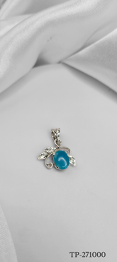 TURQUOISE STONE PENDANT WITH LEAF DESIGN ON STERLING SILVER. TURQUOISE IS KNOWN AS ONE OF THE MOST SPIRITUAL STONES IN THE WORLD OF CRYSTALS.