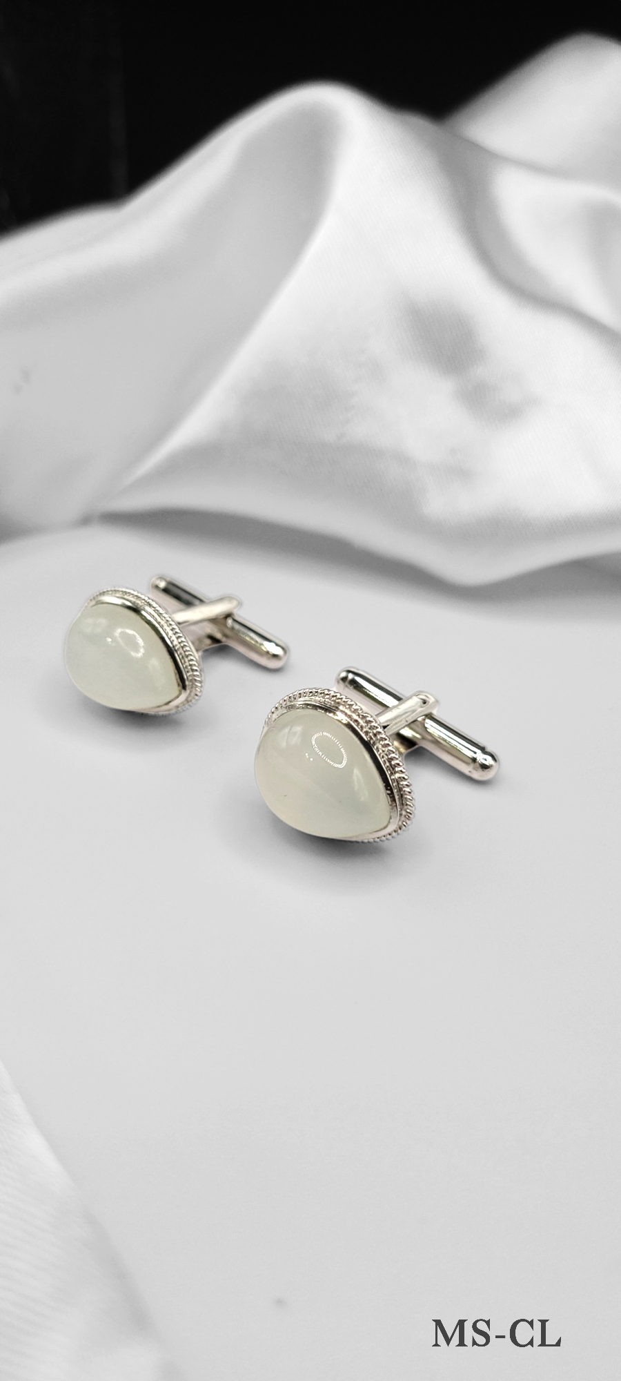 MOONSTONE CUFF LINKS ON STERLING SILVER. BEST KNOWN AS THE STONE OF ''NEW BEGINNINGS''