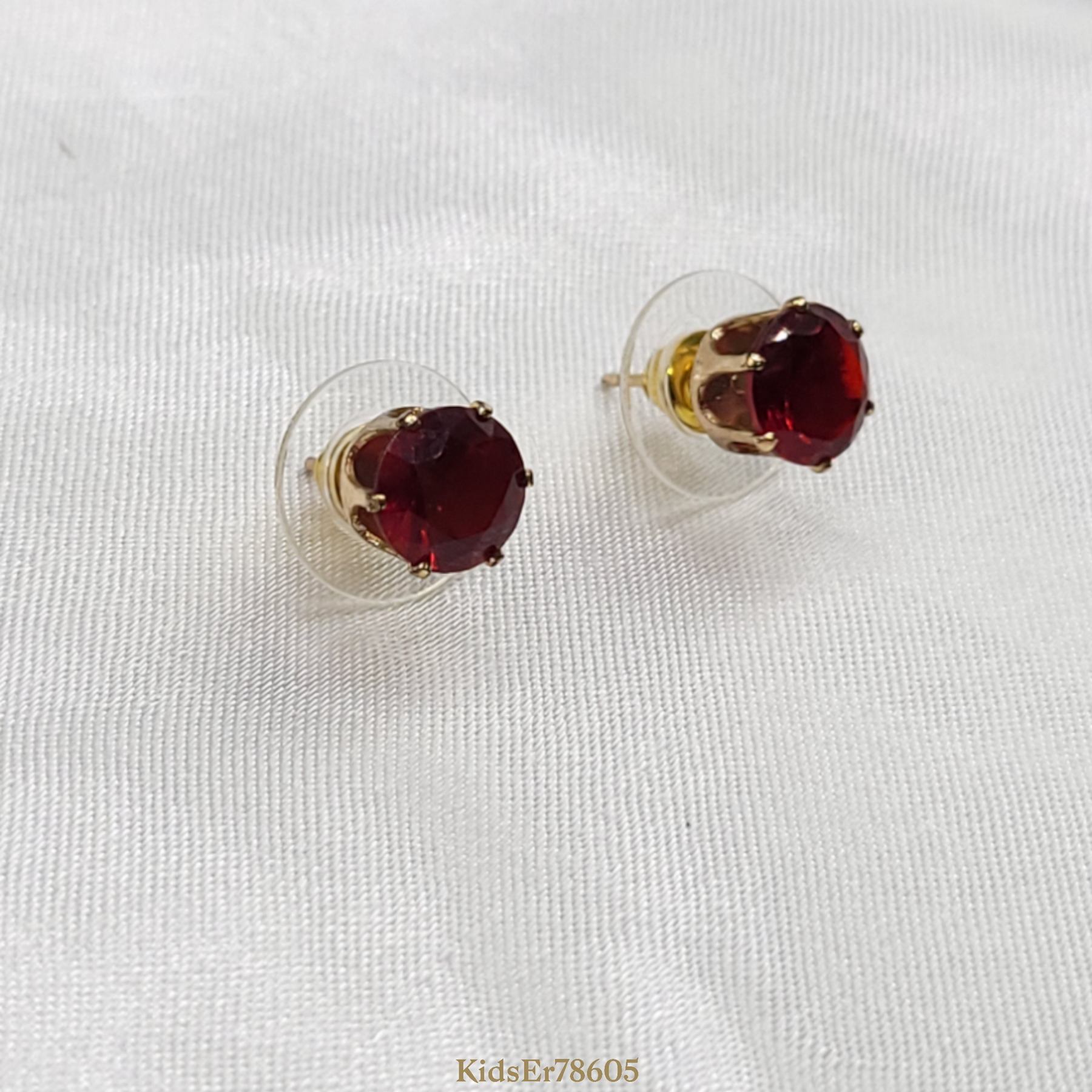 Red stone stud style earrings
