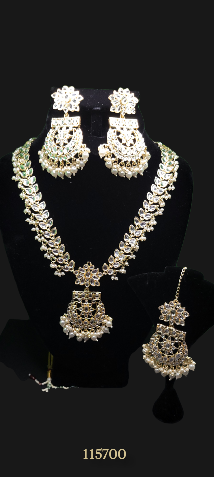 KUNDAN PEARLED NECKLACE SET WITH EARRINGS AND MAANG TIKKA
